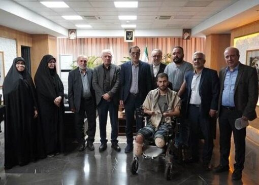 دیدار رئیس بنیاد شهید و امور ایثارگران با جانباز سرافراز حسین محمدی